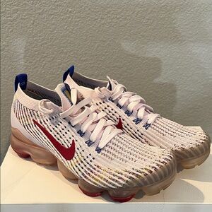 Women’s Nike multicolor pink and burgundy Flyknit Sneakers